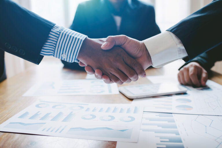 handshake business deal merger