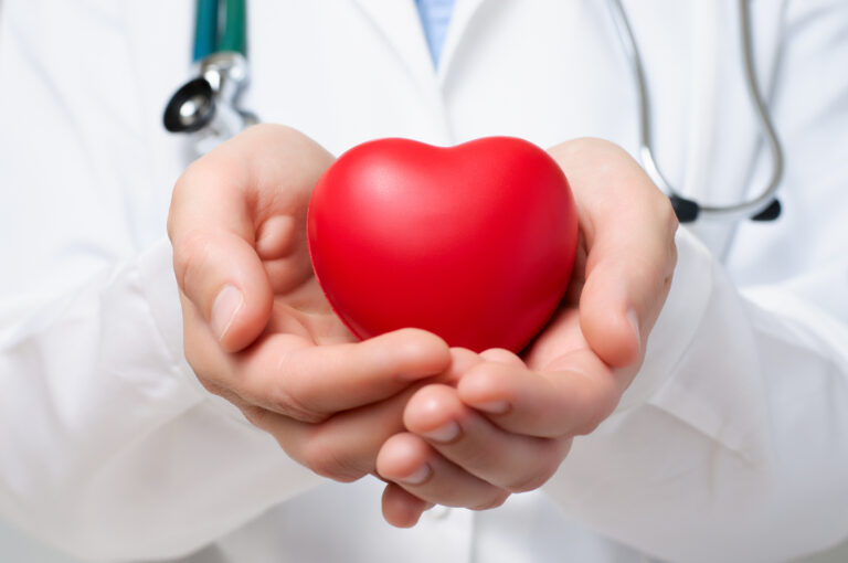 doctor holding heart organ transplant concept 1