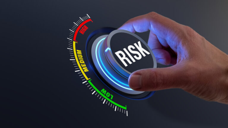 24 04 11 a hand turning up a dial labeled risk mf dload getty risk diversification safety 1200x675 128554e