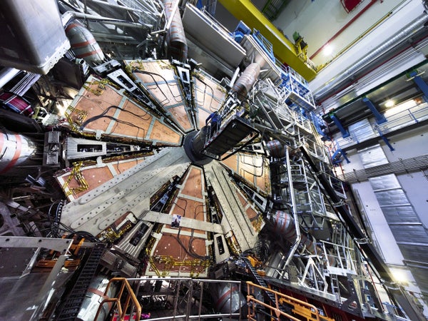 Wheel is lowered in the ATLAS cavern at the LHC level