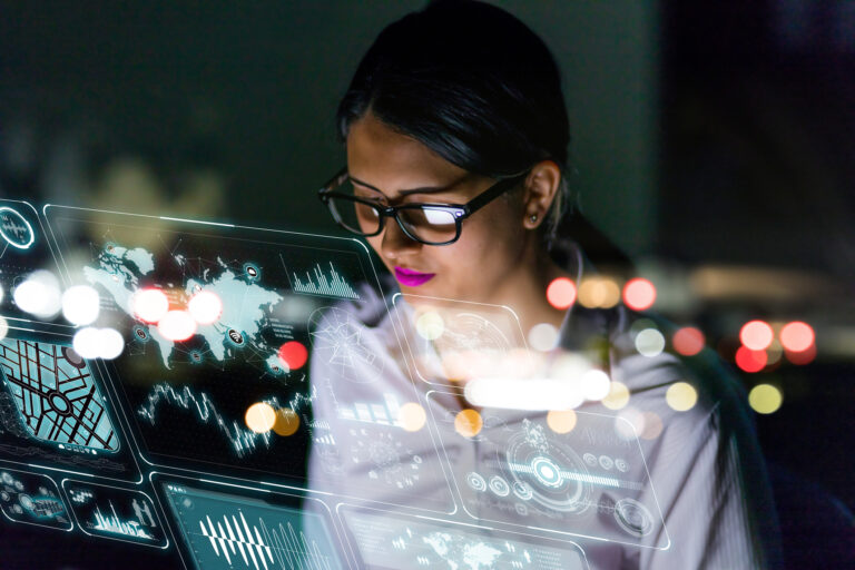 a person looking at graphs and charts on a futuristic see through interface