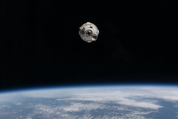 boeing starliner above earth