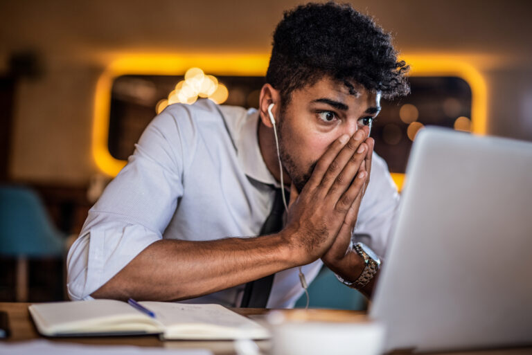 surprised person looking at computer