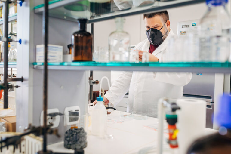 researcher works at lab bench