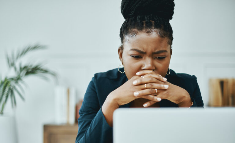 woman 20s laptop serious gettyimages 1355037951