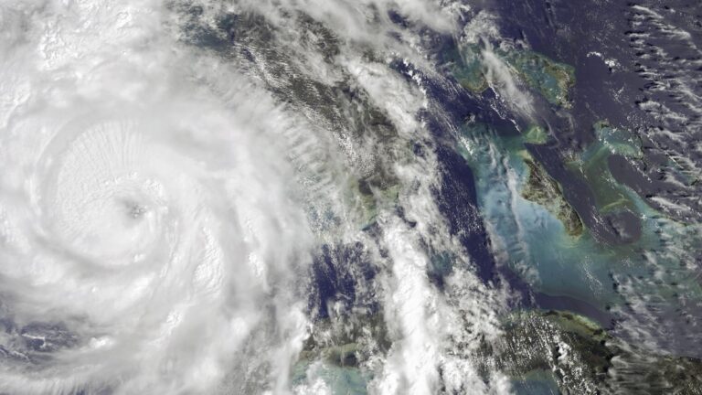 Satellite image of Category 4 Hurricane Helene making landfall in Florida USA with powerful winds and heavy rainfall causing widespread damage