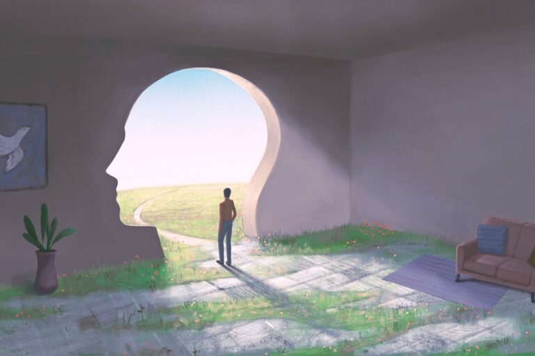 person looking out from room through head shaped passageway