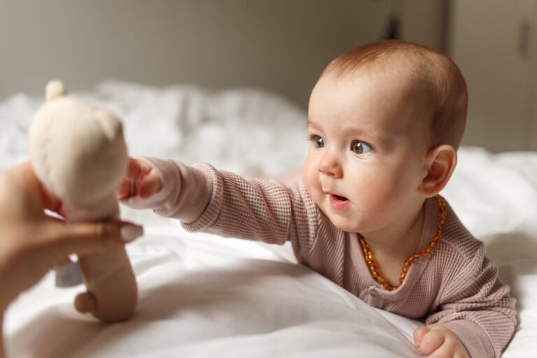 Baby girl playing whith toy