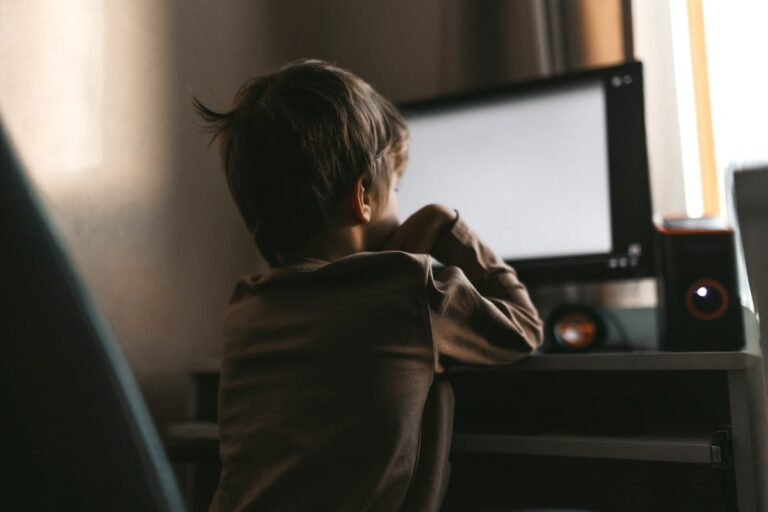 Little boy at home computer during quarantine