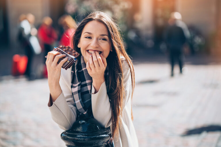 a person eating chocolate
