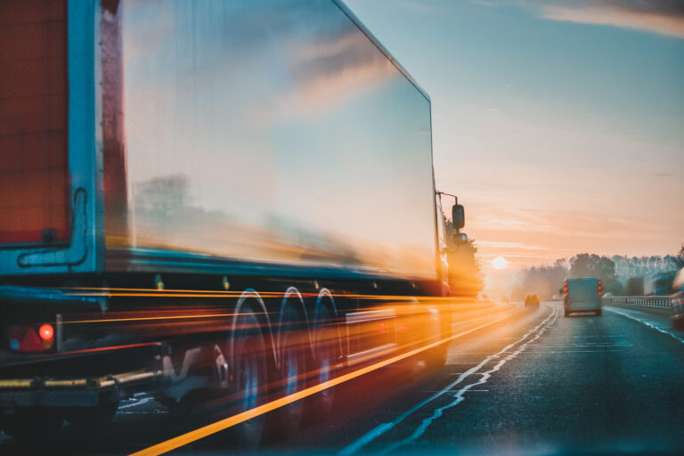 truck driving down a highway